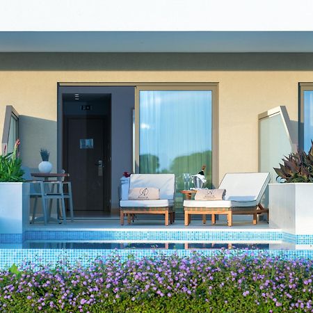 Ammoa Luxury Hotel & Spa Resort Nikiti  Exterior photo A typical room at the hotel