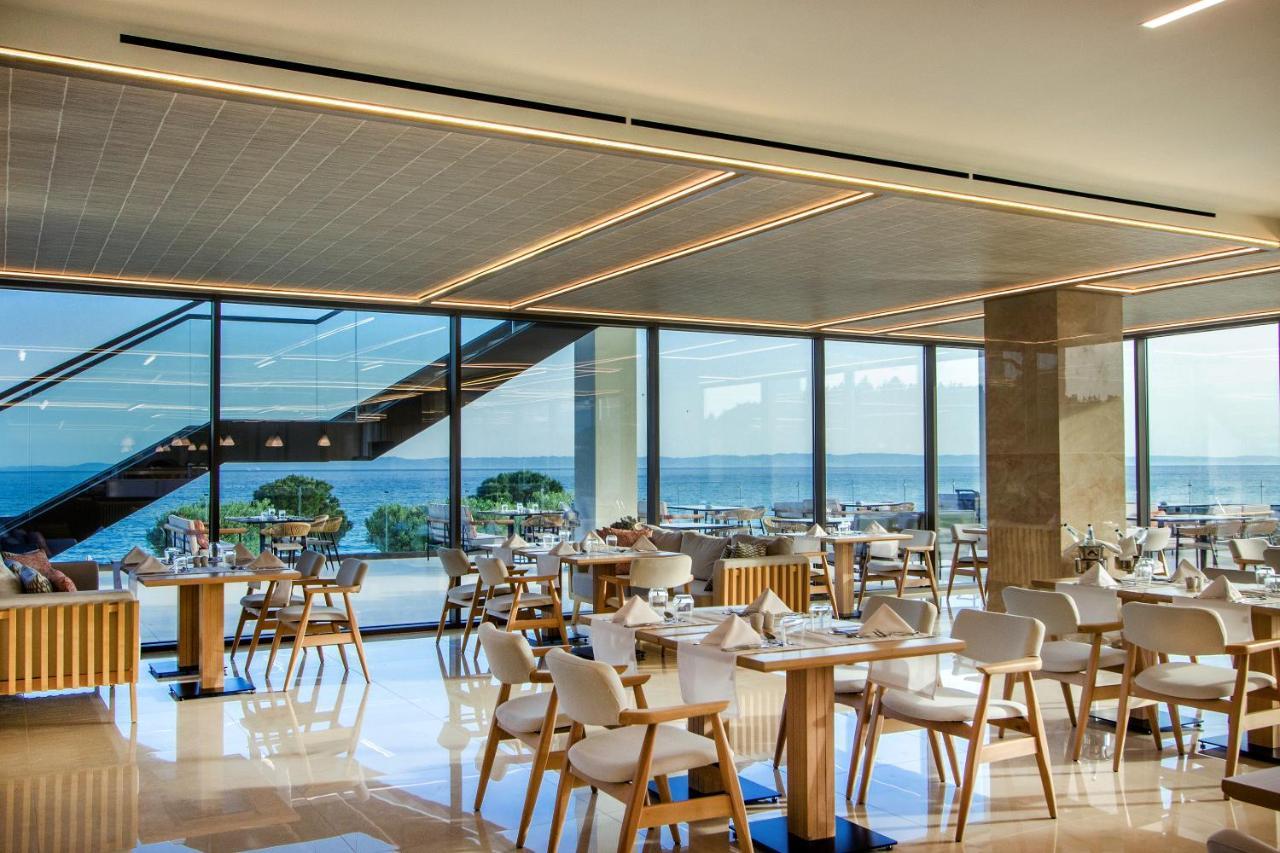 Ammoa Luxury Hotel & Spa Resort Nikiti  Exterior photo The restaurant