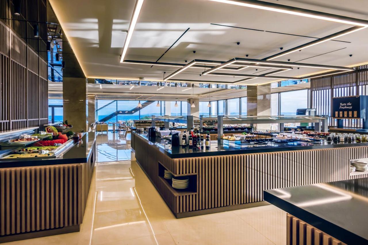 Ammoa Luxury Hotel & Spa Resort Nikiti  Exterior photo The buffet at the 101 lounge