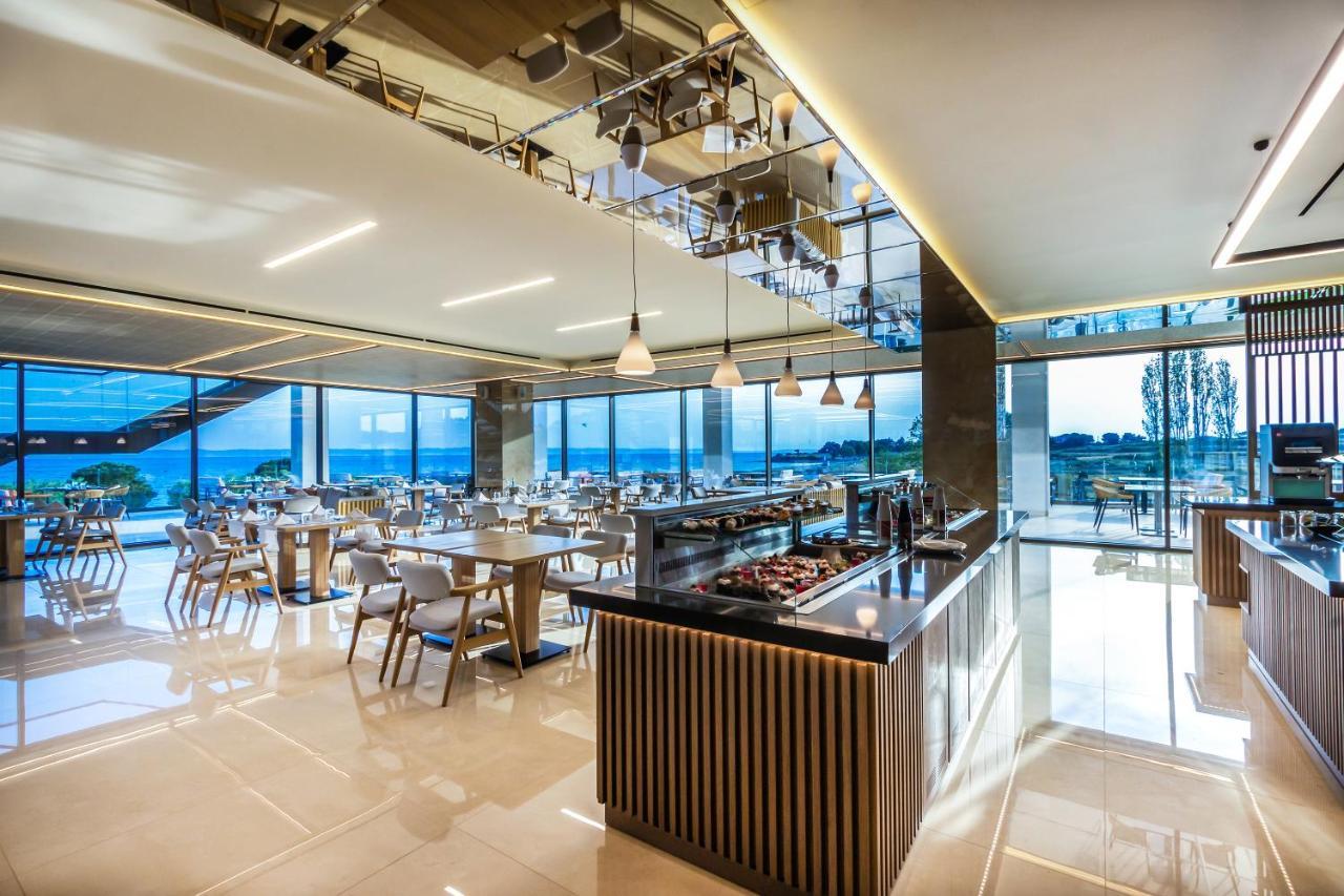Ammoa Luxury Hotel & Spa Resort Nikiti  Exterior photo The restaurant