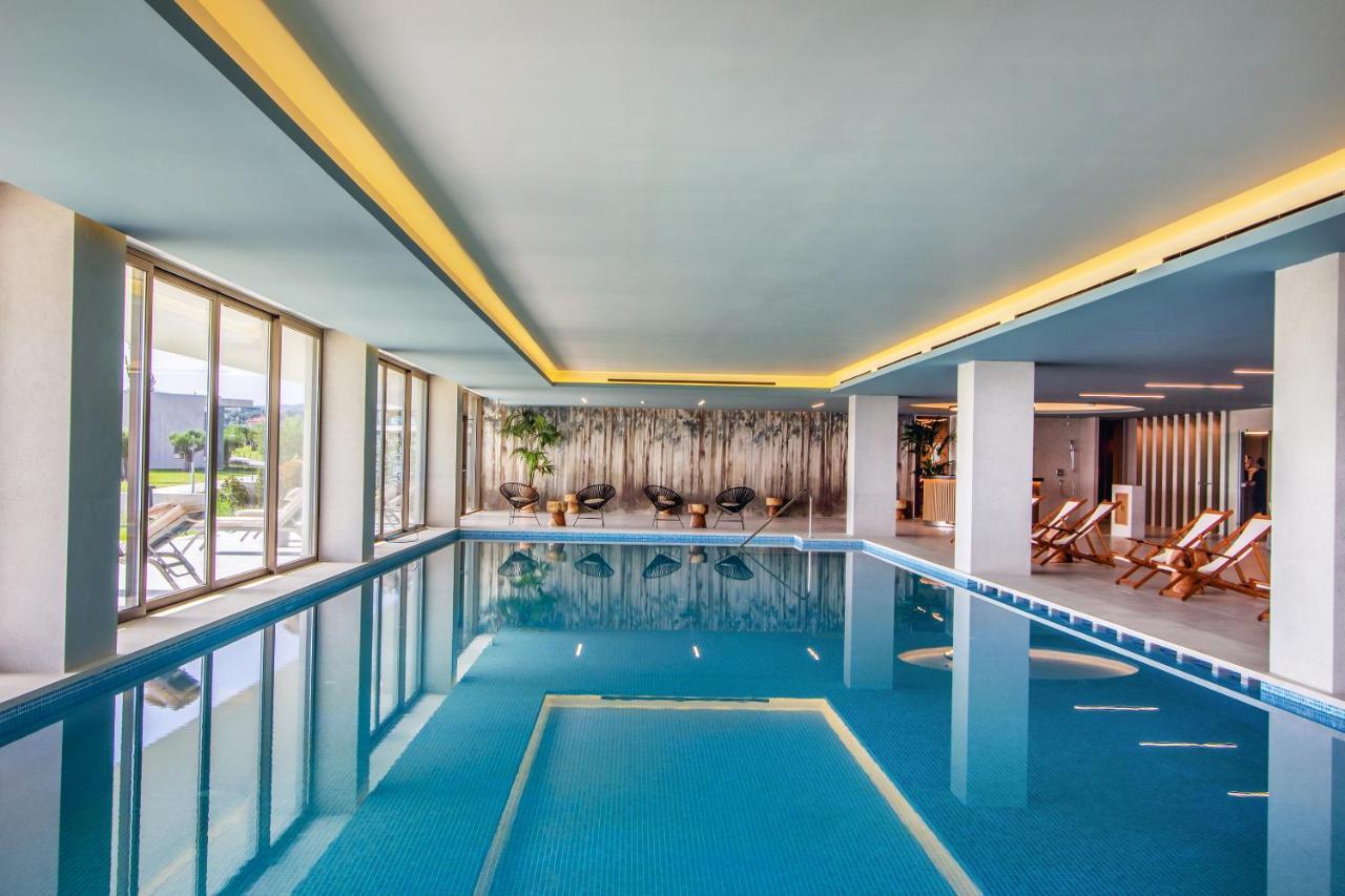 Ammoa Luxury Hotel & Spa Resort Nikiti  Exterior photo The swimming pool at the hotel