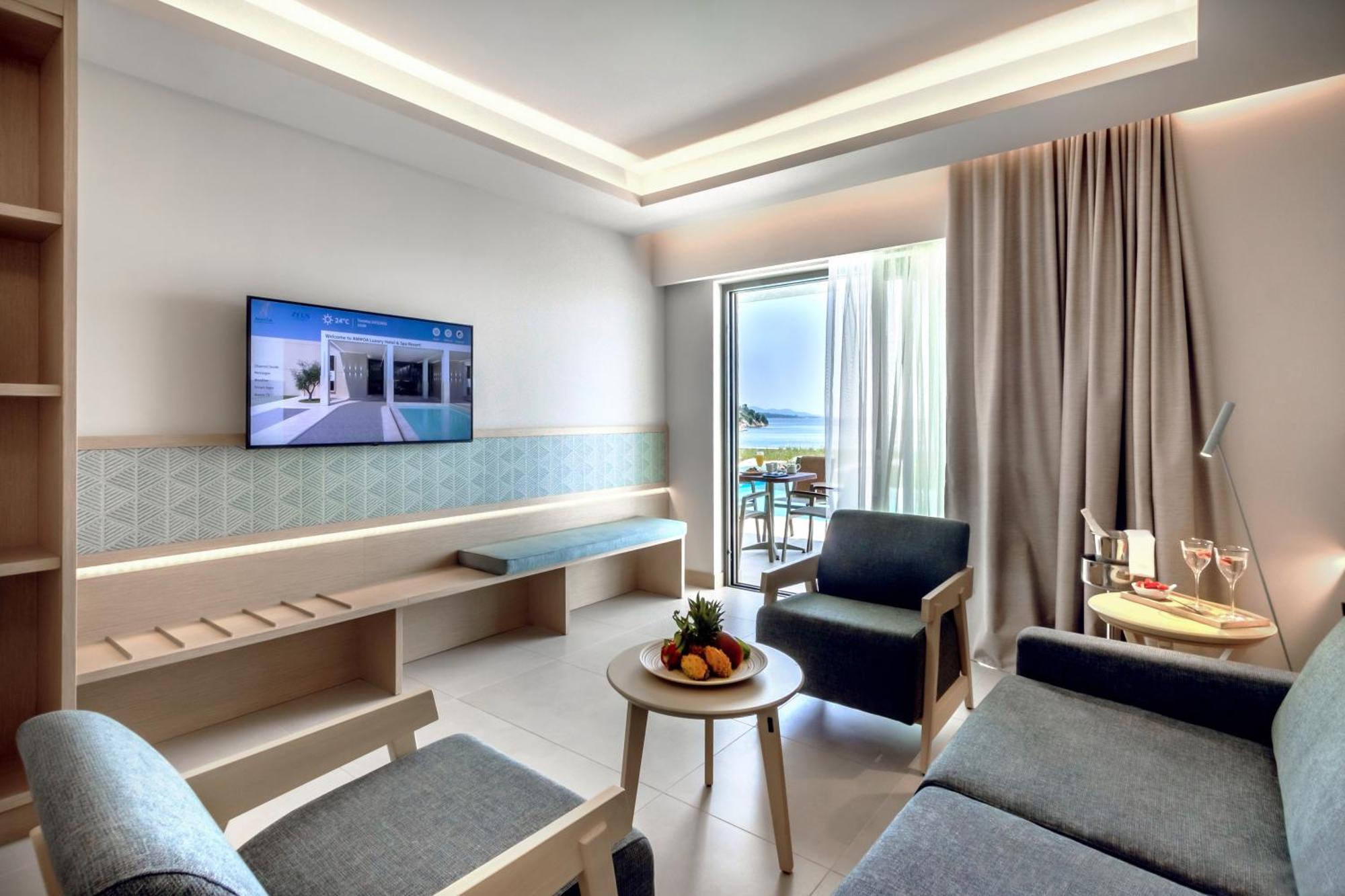 Ammoa Luxury Hotel & Spa Resort Nikiti  Exterior photo A room at the hotel