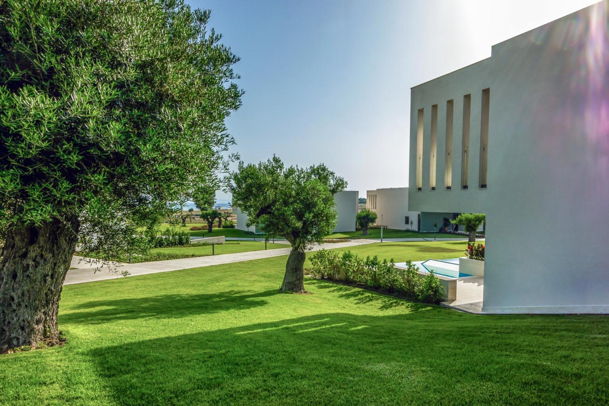 Ammoa Luxury Hotel & Spa Resort Nikiti  Exterior photo The campus of the University of Patras